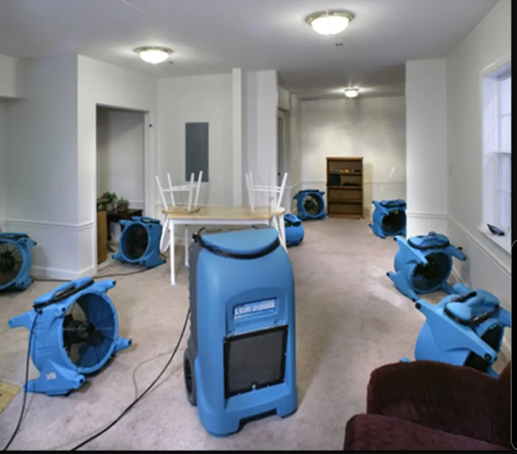 Air movers and dehumidifier setup for Water Damage Restoration in Weymouth Town